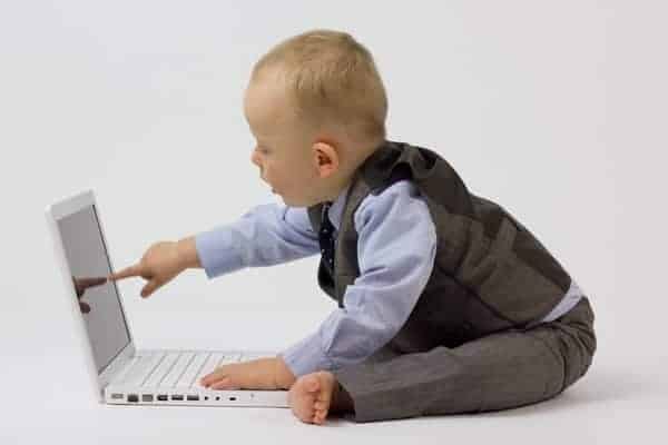 Business Baby Pointing by Paul Inkles