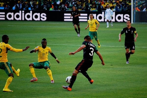 selecting the right lens Mexico - South Africa Match at Soccer City by Celso FLORES