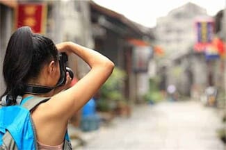 Backpacker with Camera