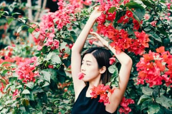outdoor posing girl with flowers
