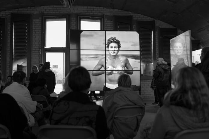 People viewing Annie Leibovitz exhibition