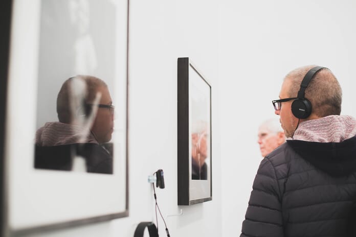 man viewing photo