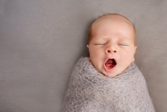 Baby yawning newborn photography tips