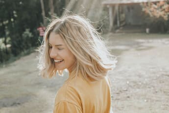 sun behind women portrait