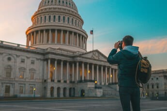 A photographer at the US Capitol Building in Washington DC