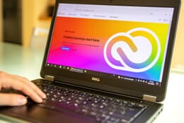 Installing Adobe Creative Cloud on a laptop.