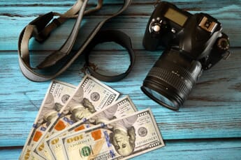 US Dollars and a Camera