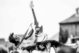 Band performing with fans