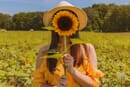 Spring photoshoot ideas woman with sunflower
