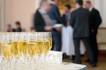 Champagne glasses for event participants.
