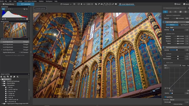 DxO PhotoLab 6 interface with editing sliders, a histogram, and an image of a colorful cathedral interior with a high ceiling.