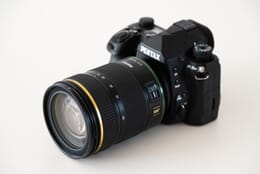 Pentax K-3 III camera with a 16-50mm f/2.8 lens attached.