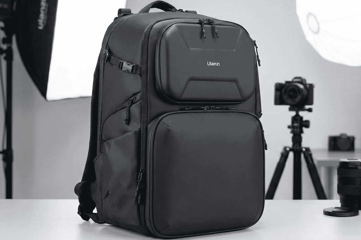 Sleek black Ulanzi camera backpack with multiple compartments, ideal for photographers needing durable gear storage in studio or travel setups.