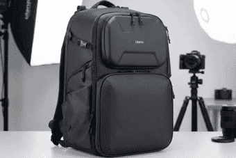 Sleek black Ulanzi camera backpack with multiple compartments, ideal for photographers needing durable gear storage in studio or travel setups.
