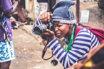 Photographer focusing camera - camera focus points explained
