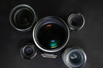 Camera lenses on display - CP+ 2026 lens announcements roundup