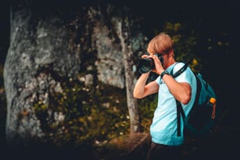 Photographer taking a portrait photo of a model demonstrating cute poses for Instagram