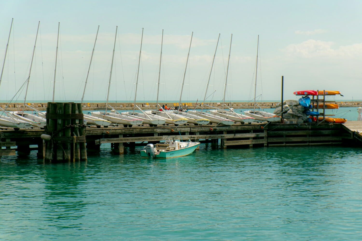 Boats docked at a serene harbor - sample photo taken with Kodak PIXPRO FZ55