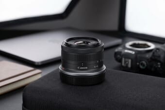 Canon RF-S 18-45mm lens on a photographer desk — best lens for beginner photographers