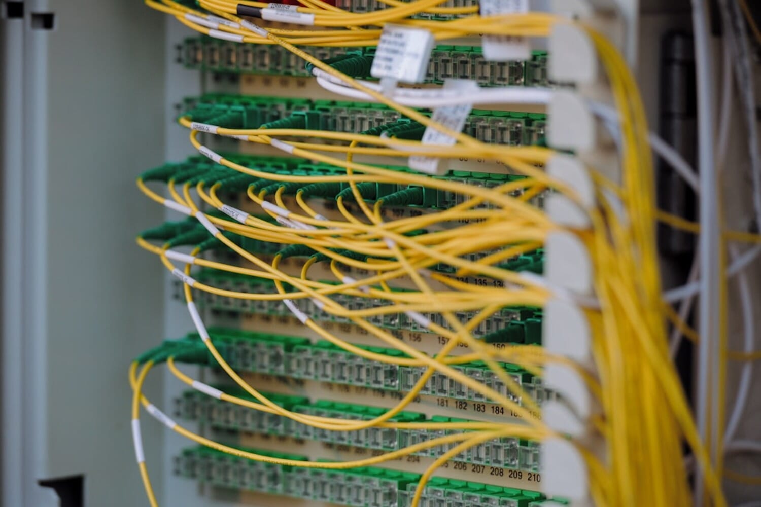 Data center server cables representing cloud storage infrastructure for photo backups