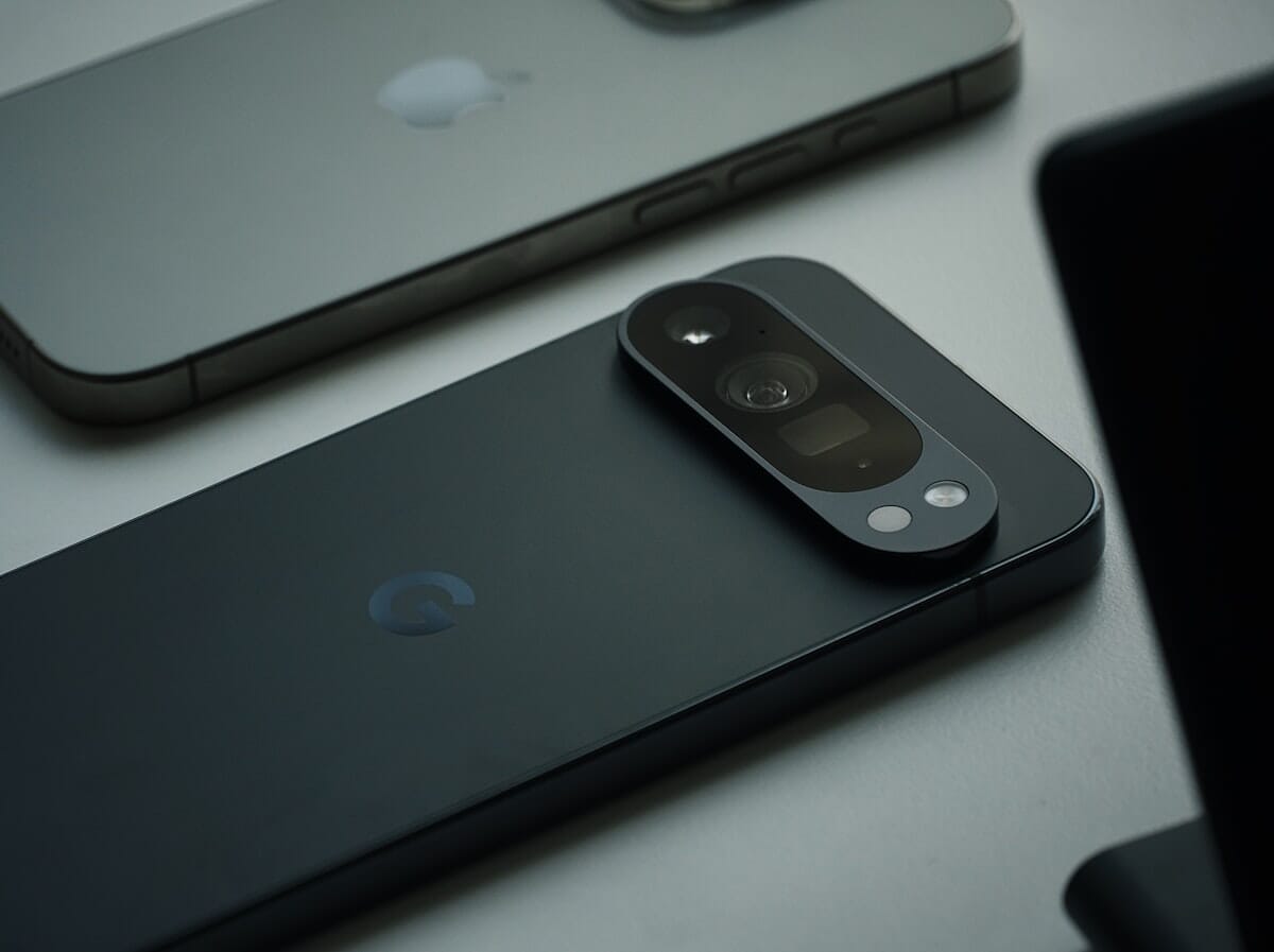 iPhone and Google Pixel smartphones side by side showing camera modules — iPhone 17e vs Pixel 10 camera comparison
