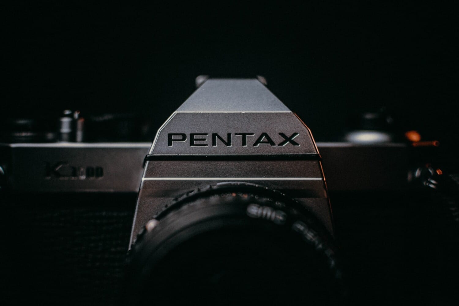 Pentax DSLR camera on a table