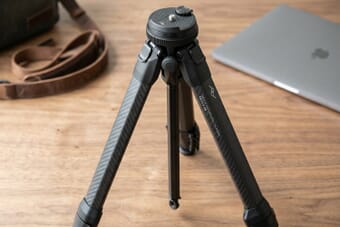 Peak Design Travel Tripod carbon fiber with ball head on wooden desk