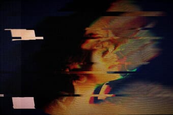 Distorted glitch portrait representing AI-generated deepfakes and digital image manipulation