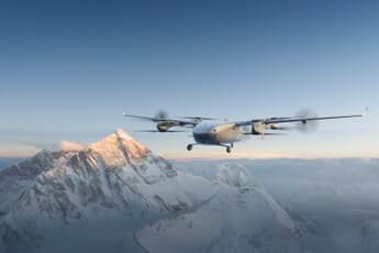 DJI EV50 VTOL fixed-wing cargo drone flying above the snow-capped Everest massif at sunrise